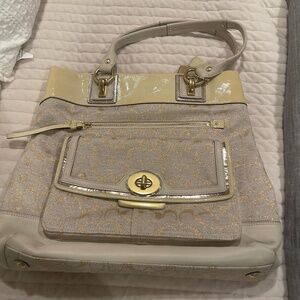 Cream and gold vintage coach purse in excellent condition.